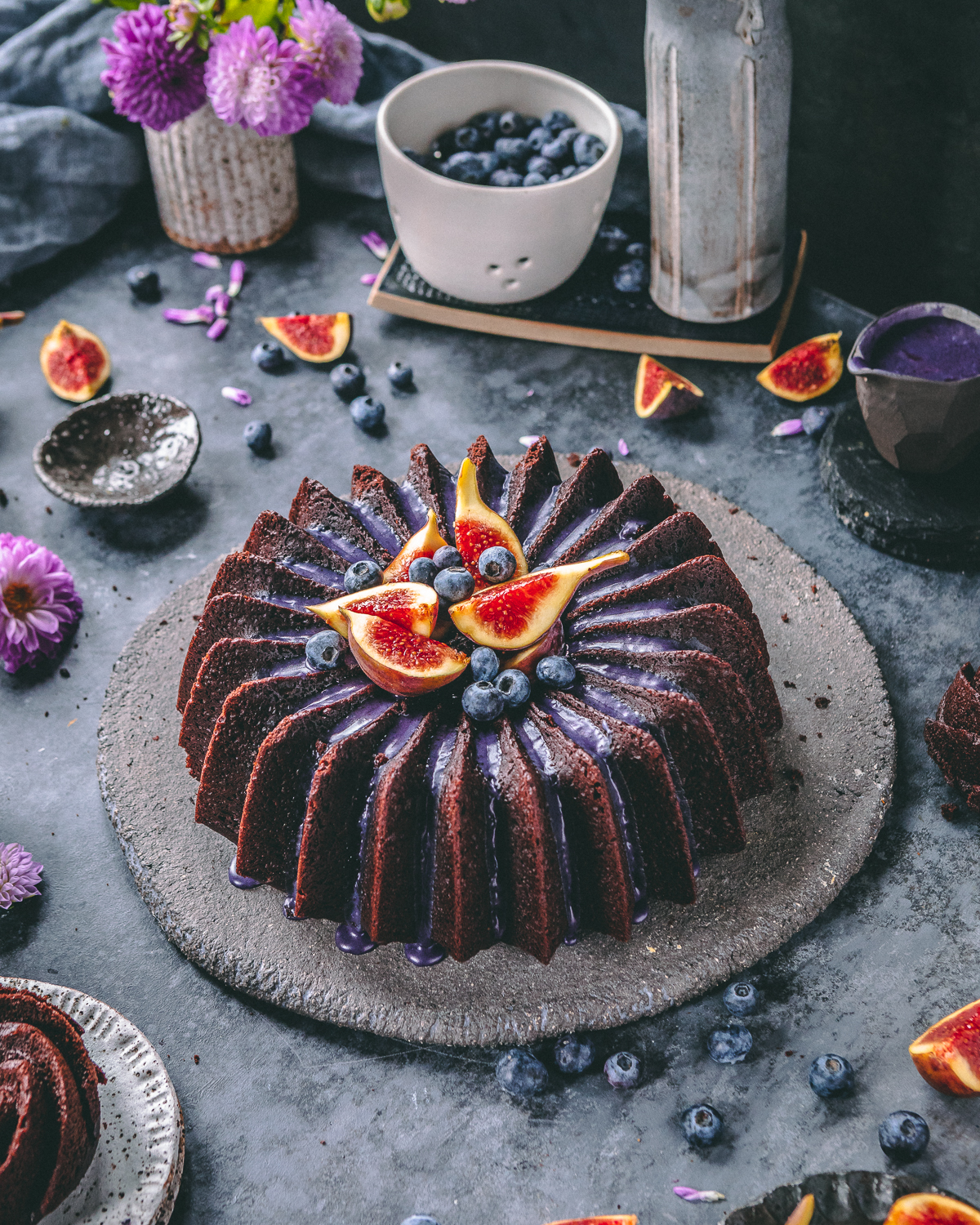 Blueberry icing on a chocolate bundt cake