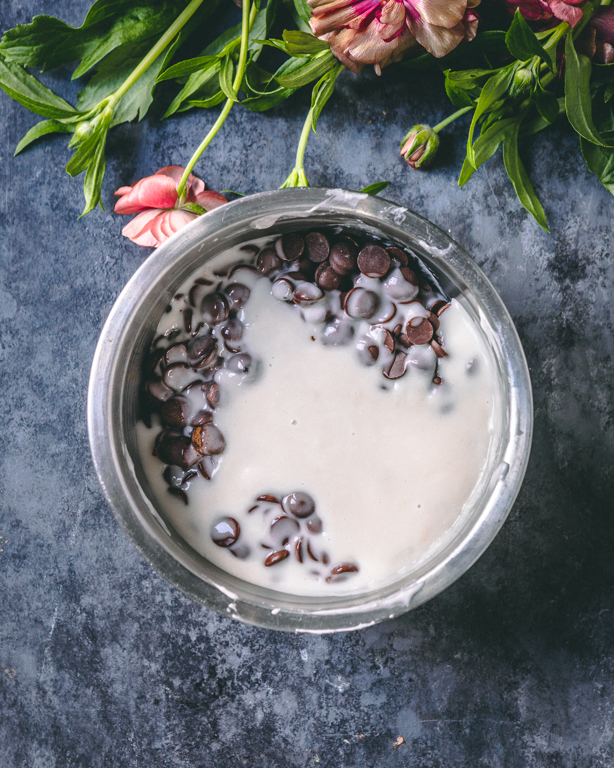 chocolate melting in hot coconut cream