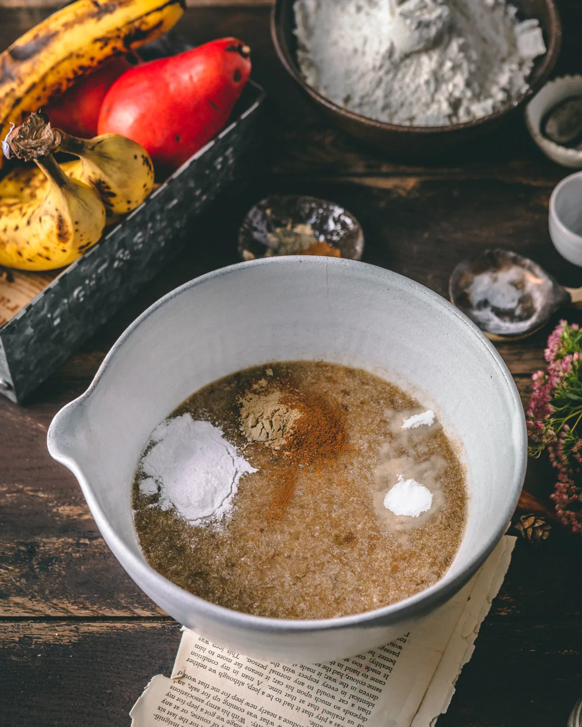 mixing-spices-in-batter-pear-banana-loaf