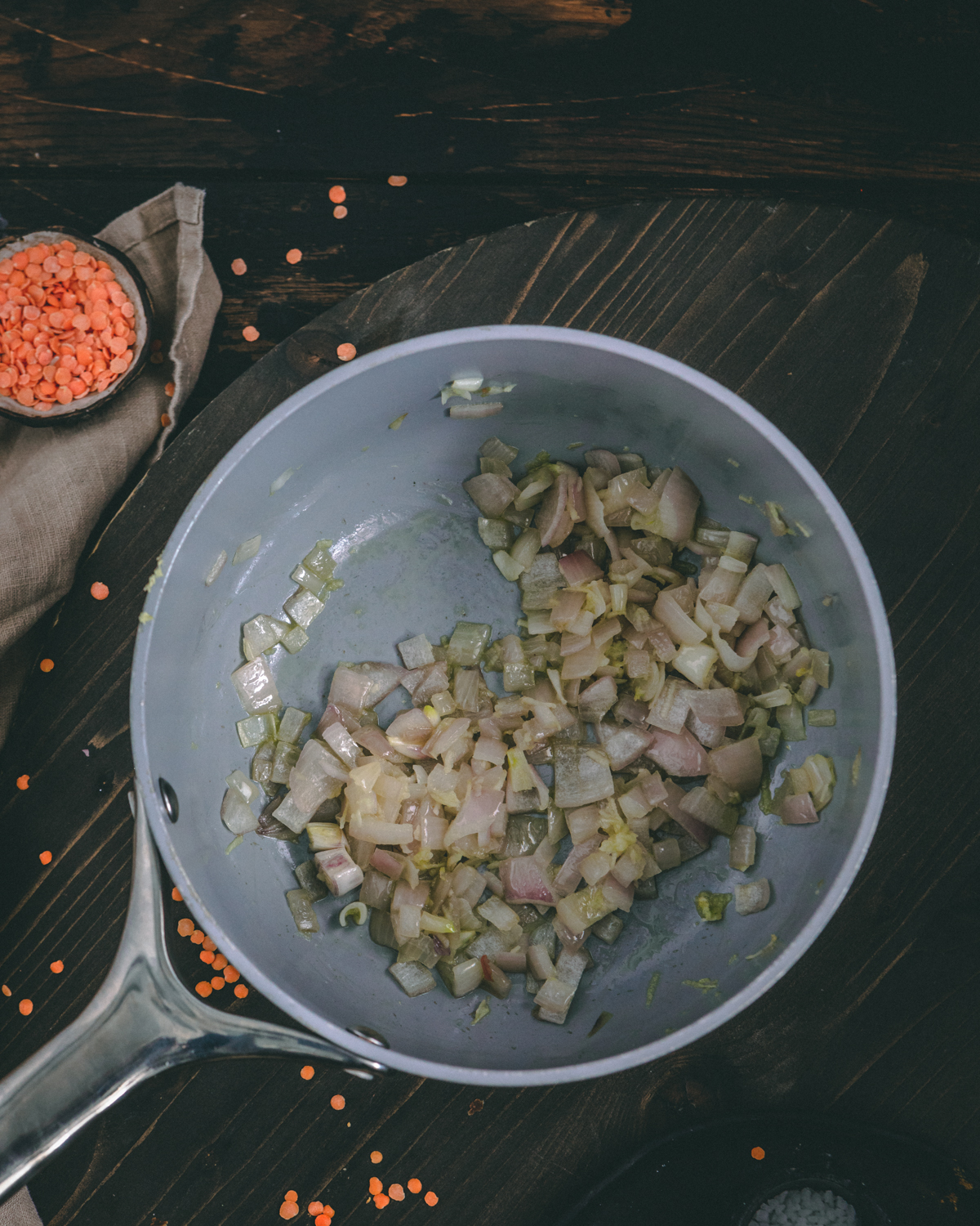 onions and garlic simmering in pot for lentils